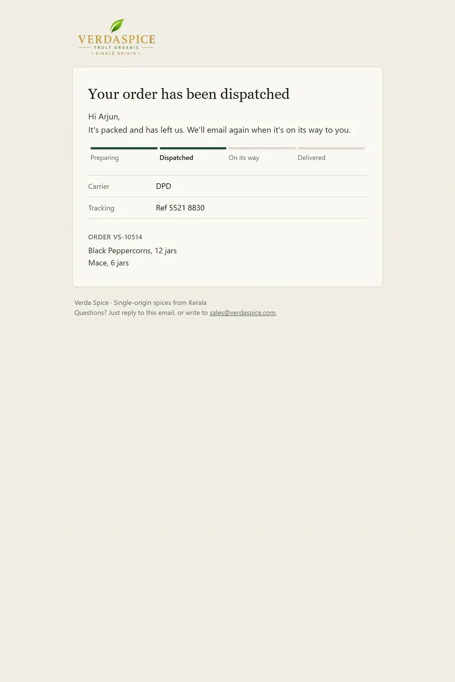 Dispatched email with a four-step progress bar, carrier and tracking reference.